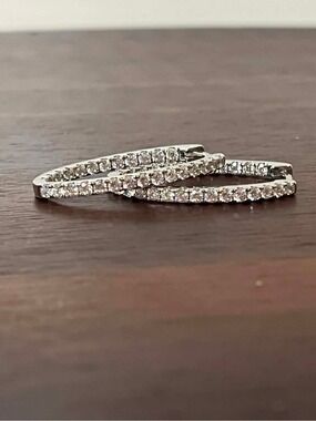 Prime Art & Jewel  Sterling Silver Cubic Zirconia Inside-Out Oval Hoop Earrings